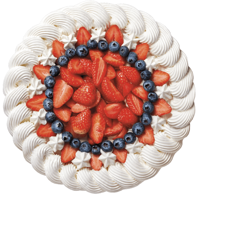 Strawberry cream cake topped with fresh strawberries and whipped cream, representing indulgent quality from [Brand Name].